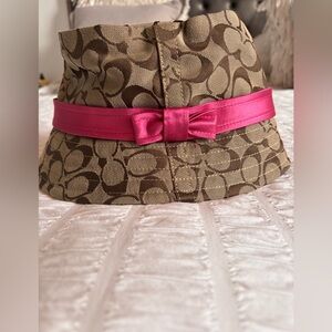 Coach Brown Patterned Hat with Pink Ribbon